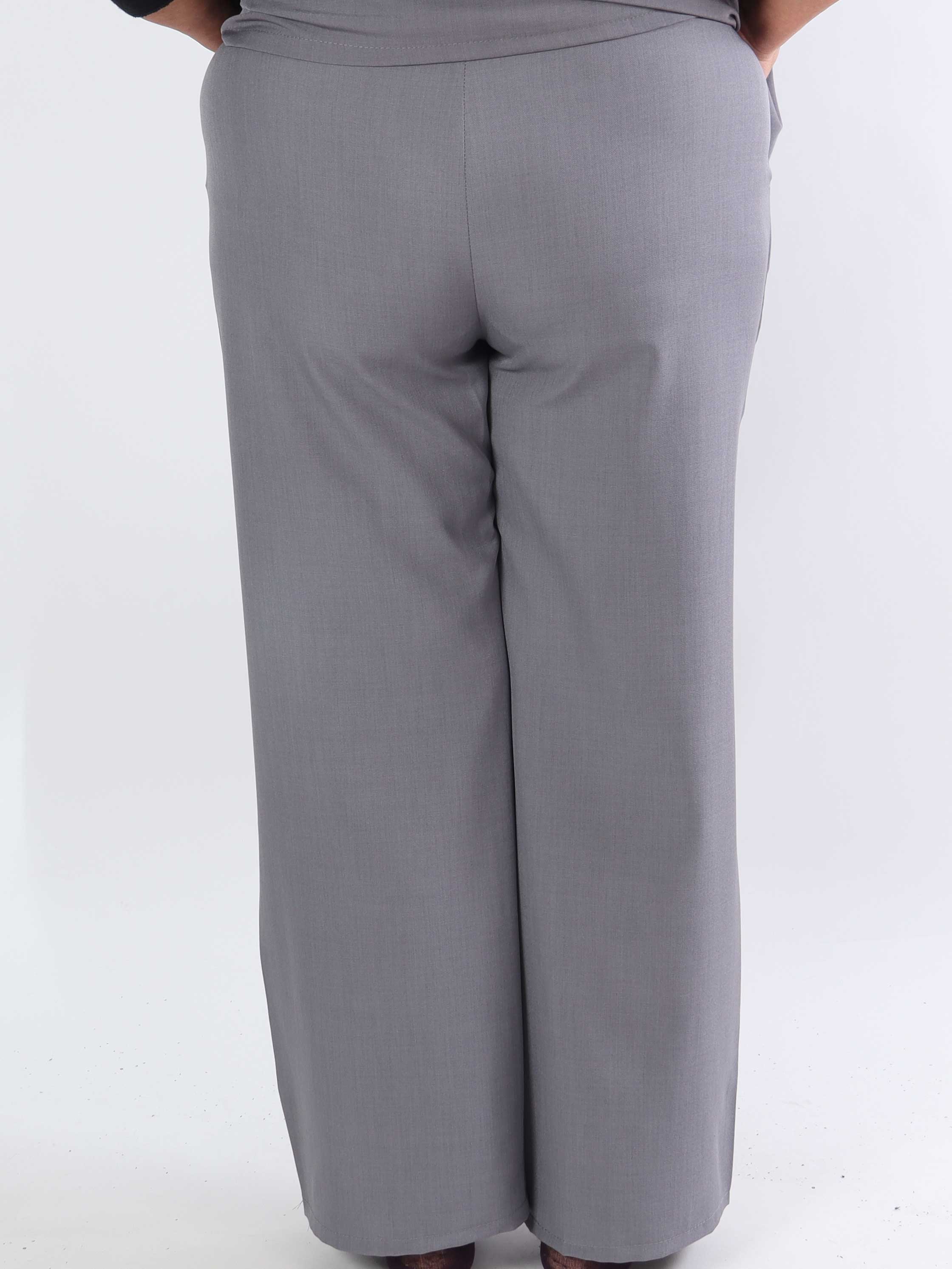 Shadia Pants - Enfärgade kostymbyxor med resår i ryggen